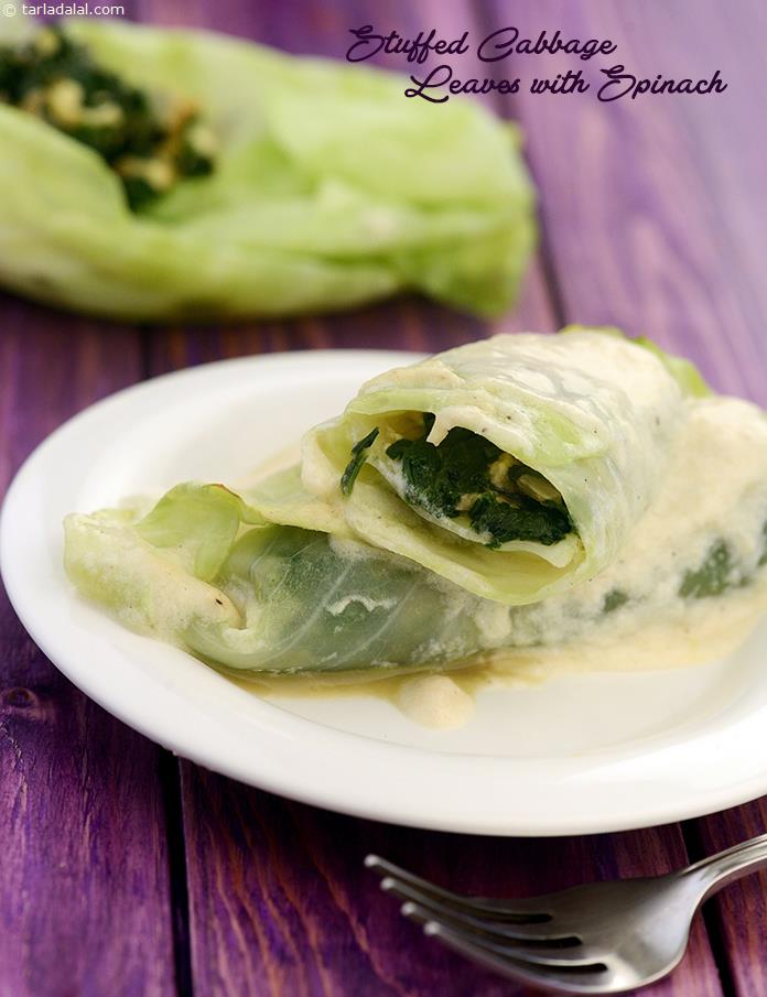Stuffed Cabbage Leaves with Spinach, a unique way to prepare cabbage filled with spinach and creamy stuffing and baked.