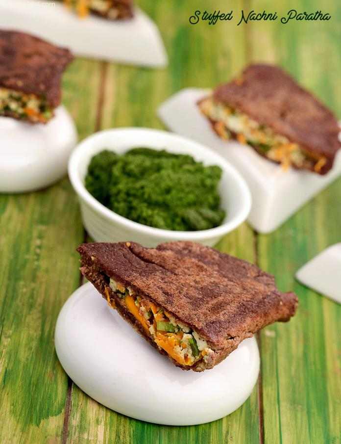 This sumptuous gluten-free paratha of nutritious ragi flour is packed with a succulent mixture of grated carrots and paneer, pepped up with coriander and green chillies. 
