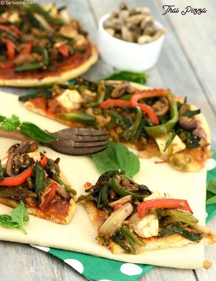 The Thai Pizza uses an innovative peanut flavoured sauce, and a crunchy topping of typically oriental veggies combined with sesame seeds, soy sauce and paneer or tofu cubes.