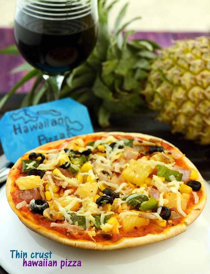 Thin Crust Hawaiian Pizza features a medley of flavours and textures, thanks to spiced pineapple, corn and mushrooms on an oh-so-crisp base. You will love the way the pineapple’s juice oozes out and fills your mouth with each bite.