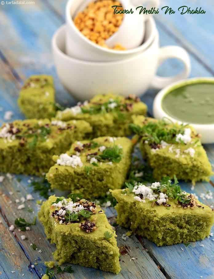 Toovar Methi Na Dhokla, the liberal use of chillies makes it appealing to spice lovers, while the goodness of toovar dal and methi makes it acceptable to the health-conscious as well.