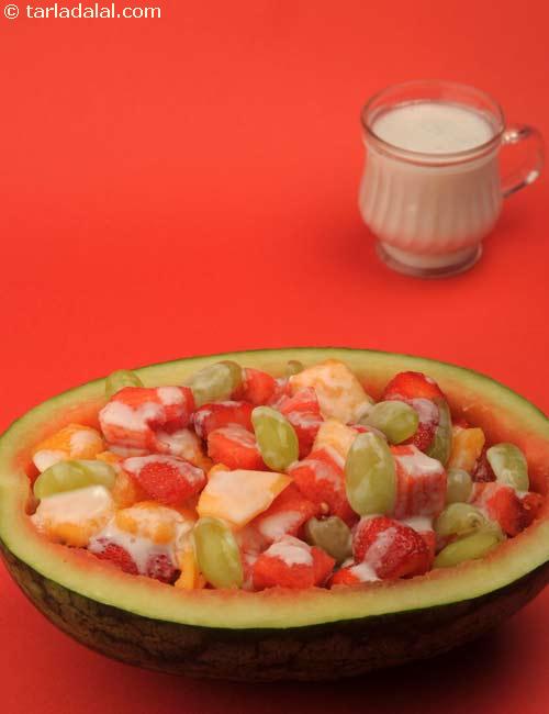 Tropical Fruit Salad With Coconut Cream Sauce ( Eggless Desserts Recipe)