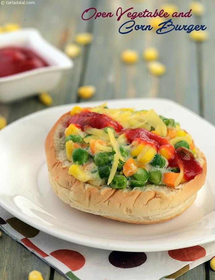 Vegetable and Corn Hot Dog Roll, colourful veggies and juicy sweet corn kernels bound together by a creamy white sauce, are loaded onto a fresh and soft burger bun, topped generously with cheese, and grilled. 