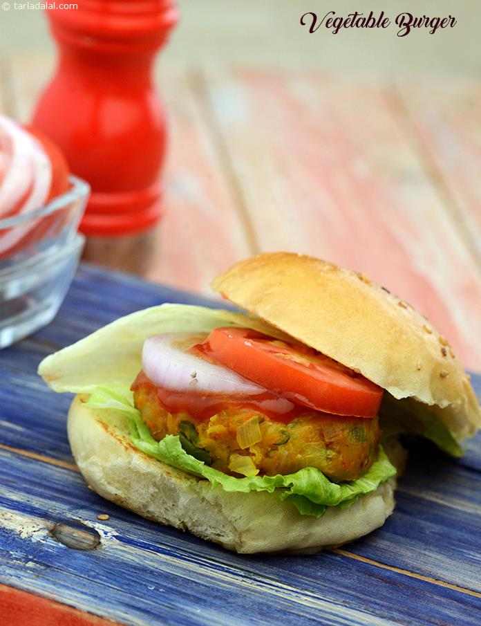 Vegetable Burgers, a special salad of shredded veggies spruced up with mayonnaise and mustard powder, which accompanies the crisp patties along with standard fittings like veggie slices, lettuce, and so on. This burger is really a mega mouthful!