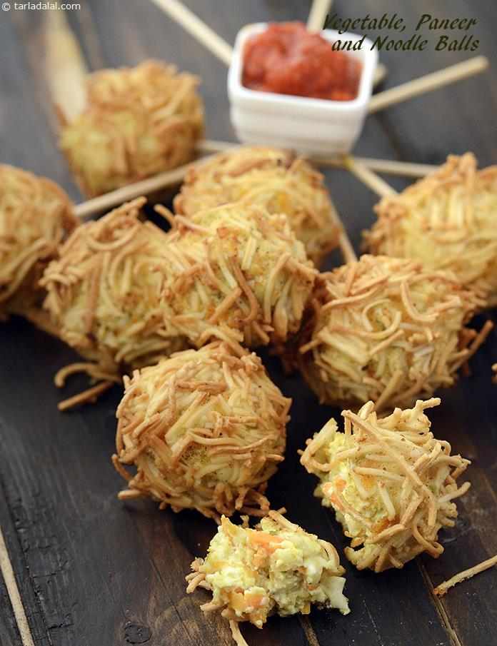 Vegetable, Paneer and Noodle Balls, the veggie and paneer mixture is dipped in a flour batter and rolled in crushed noodles before frying, to give it not only a delectable crunch but irresistible good looks too!