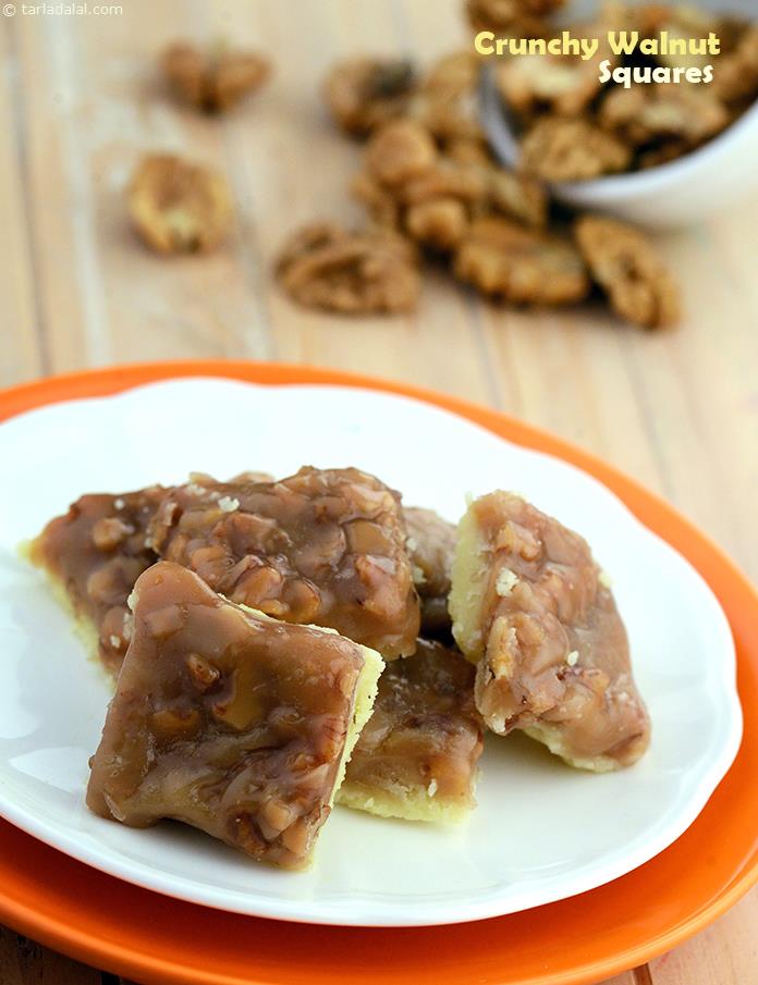 Walnut Butterscotch Bars, crisp butter cookies topped with a chewy walnut butterscotch mixture and baked to perfection, this sweet treat is so delicious that no words can do justice to it. 