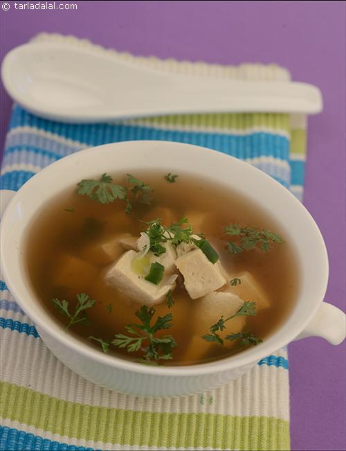 White Bean Curd Soup, tofu is simmered in water with seasoning and spices, a simple but spicy soup cooked "fat free".