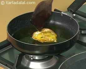 Indian Traditional Sweet Named Malpua Cooking in Hot Oil in Kadai (Frying  Pan). This Delicious Dessert is Famous in Ajmer - Rajasthan, India. Stock  Photo