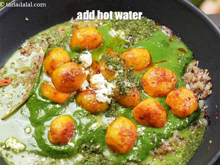 Hariyali Dum Aloo Recipe Potatoes In Spinach Coriander Gravy Green Masala Dum Aloo